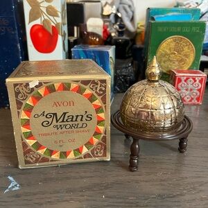 Avon A Man's World After Shave with Gold Globe Decanter